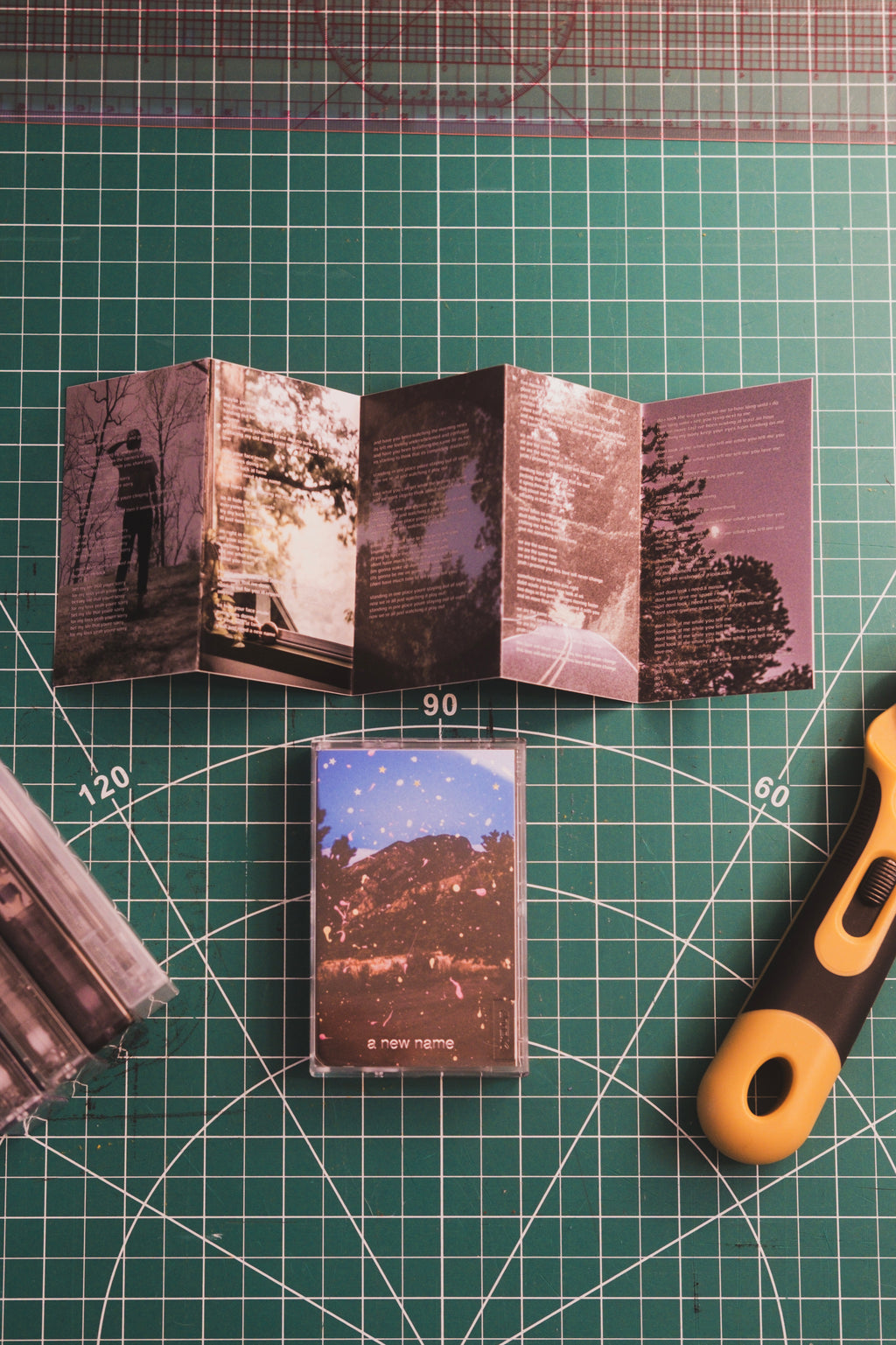 'a new name' Cassette With Lyric Booklet